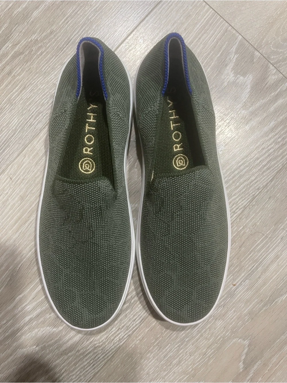 Rothy's Safari Green size 7 woman's Slip-On  sneakers with White Sole